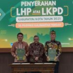 Bupati Gunung Mas Hadiri Penyerahan LHP LKPD TA 2025, Gumas Kembali Raih Opini WTP